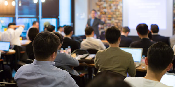 A classroom set up with a large conference TV from Data Projections