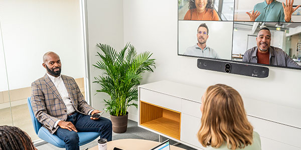 Business people using HP Poly's conferencing solutions for video call