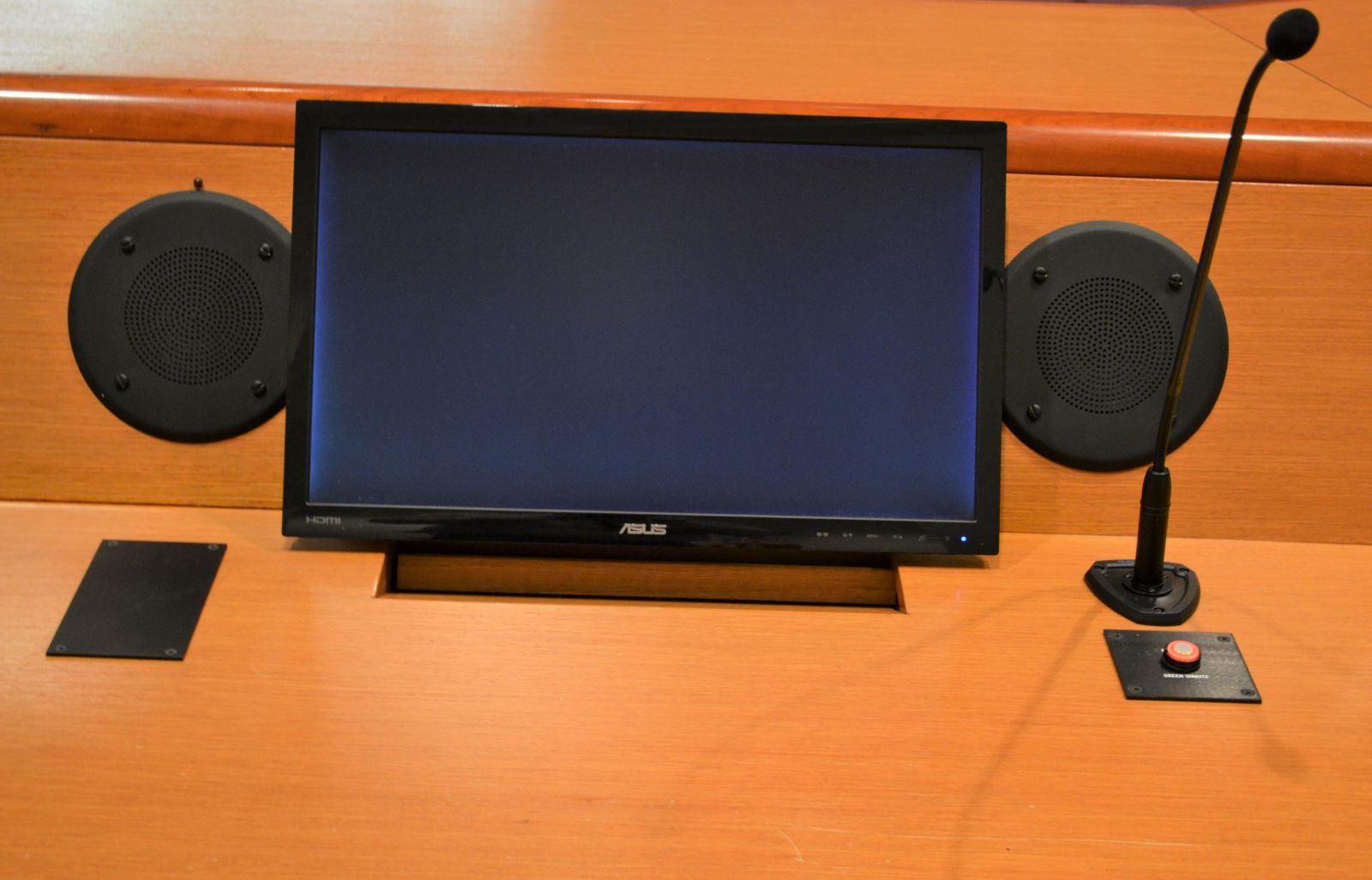 A close up of the upgraded monitors and microphones in DART's Board chamber